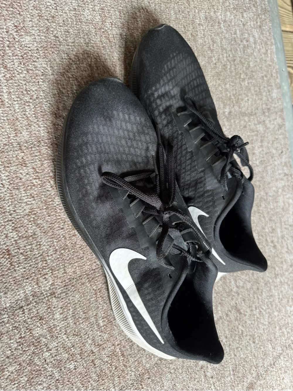 Nike Black Athletic Running Shoes with White Swoosh